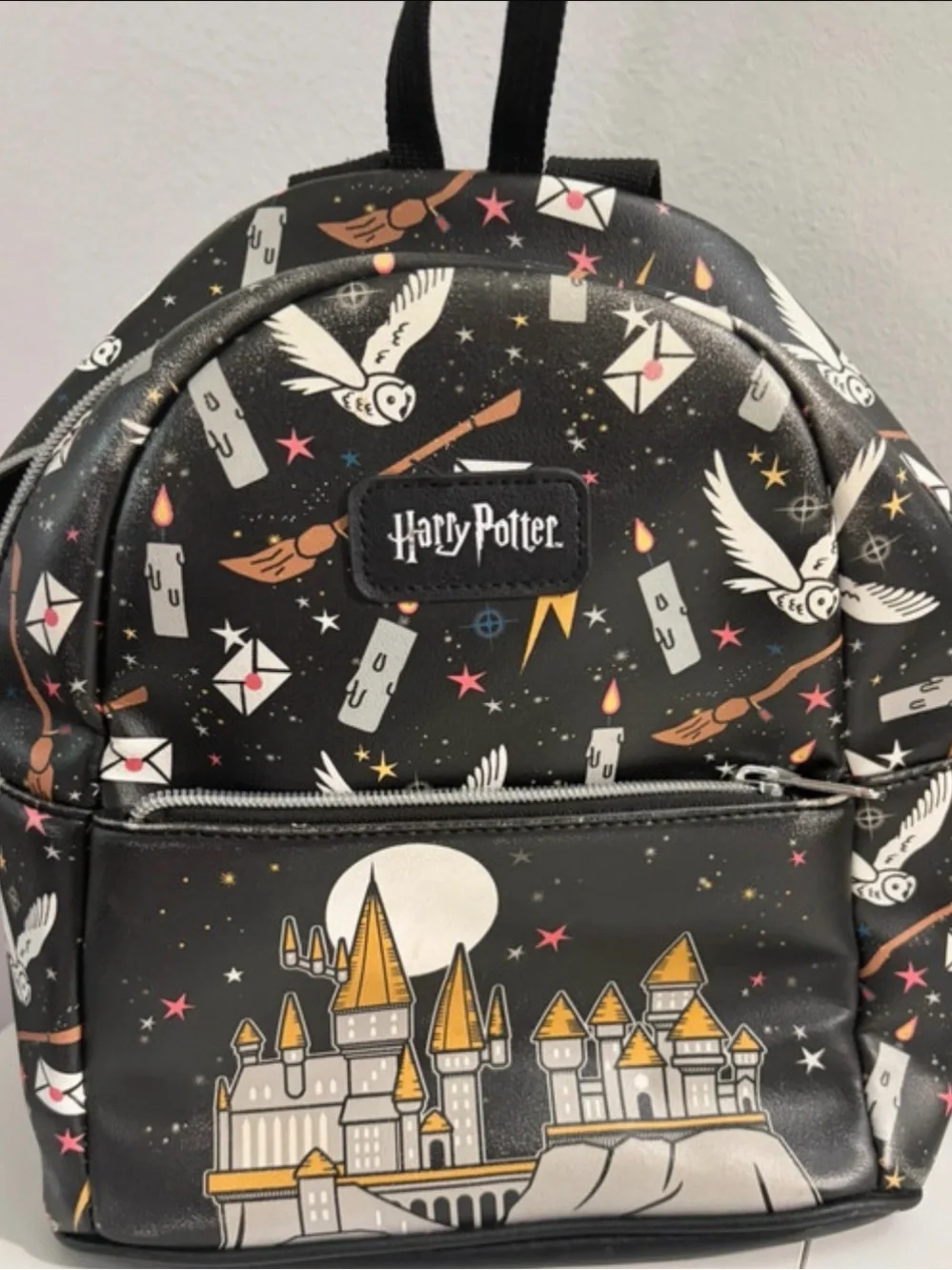 Warner Bros. Harry Potter Black Mini Backpack with Gold & White Accents